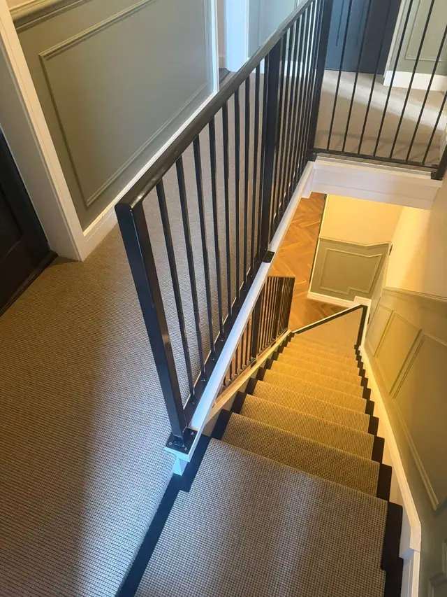Runner fitted around a landing and staircase