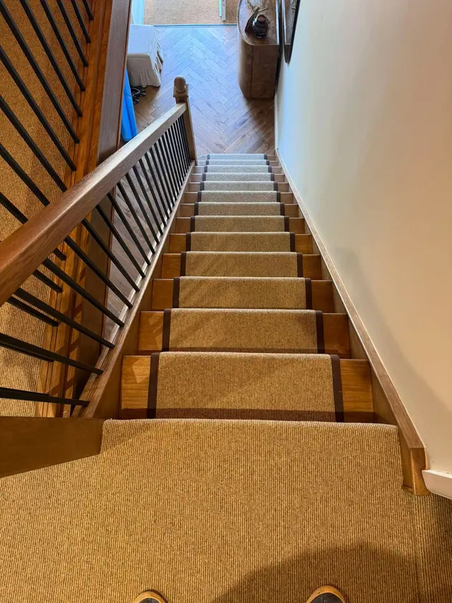 Warm runner alongside a timber balustrade