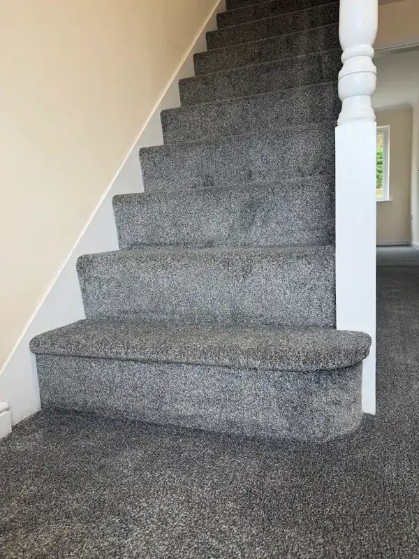 Grey carpet fitted to stairs