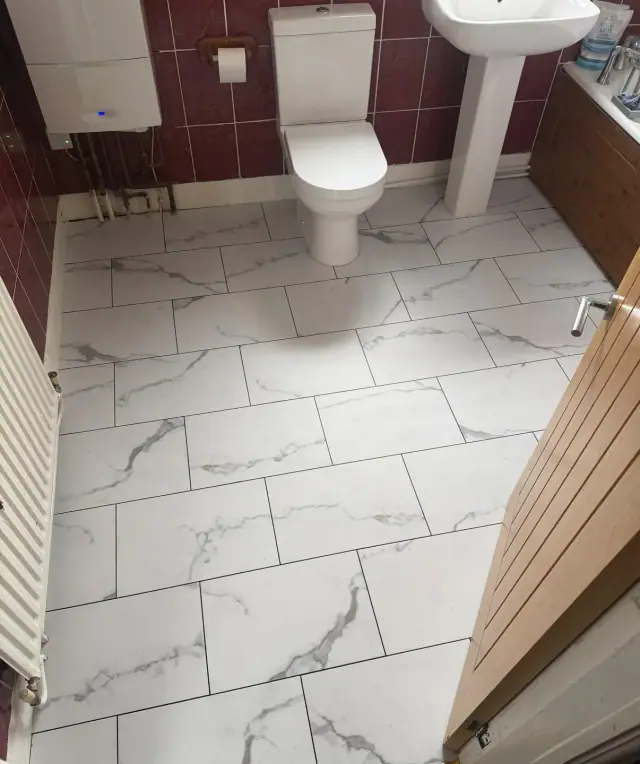 A marble-effect bathroom floor